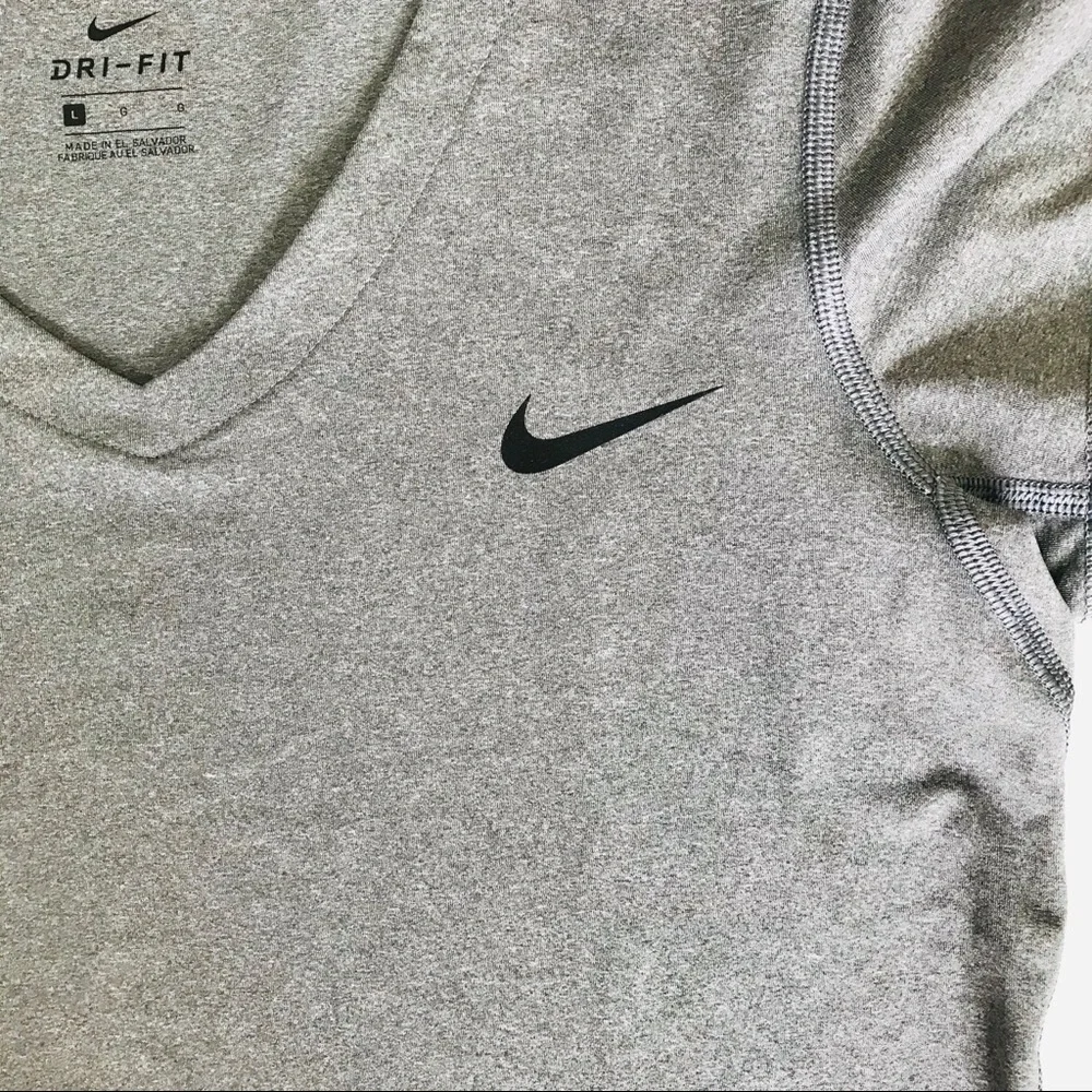 Nike Dri Fit V-Neck short sleeve top gray in EUC.